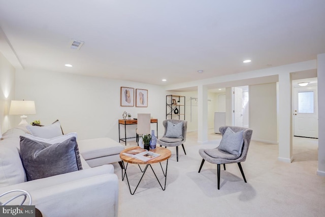 living room featuring light colored carpet