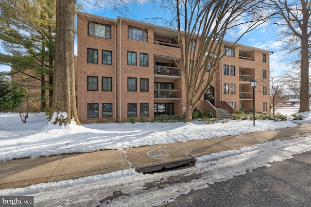 view of snow covered building