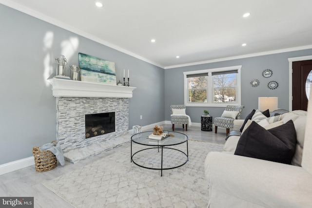 living room with light hardwood / wood-style floors and crown molding