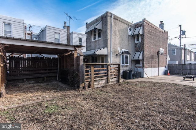 back of property with central air condition unit