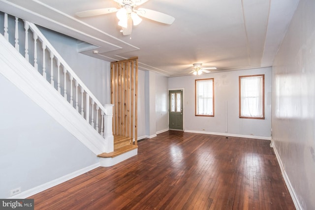 interior space with ceiling fan and dark hardwood / wood-style floors