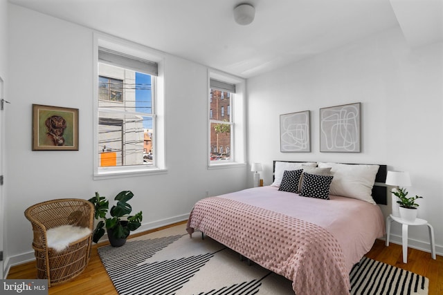 bedroom featuring hardwood / wood-style floors