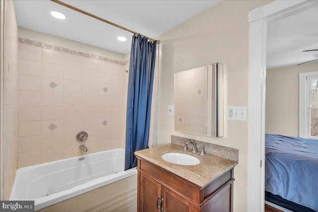 bathroom featuring vanity and shower / bath combo with shower curtain