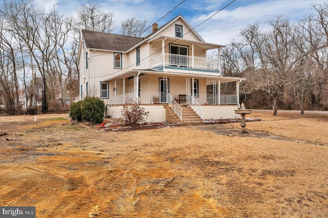 view of front of home featuring covered porch