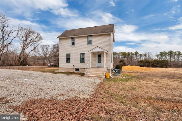 view of front of home with a front lawn