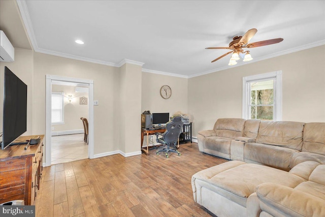 living room featuring ceiling fan, light hardwood / wood-style floors, and ornamental molding