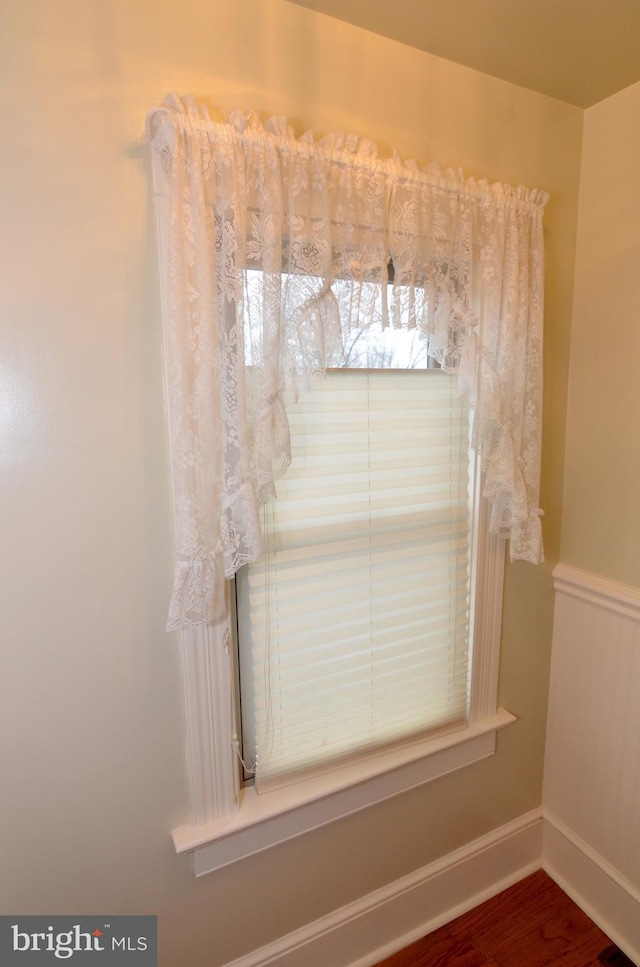 interior details with hardwood / wood-style flooring