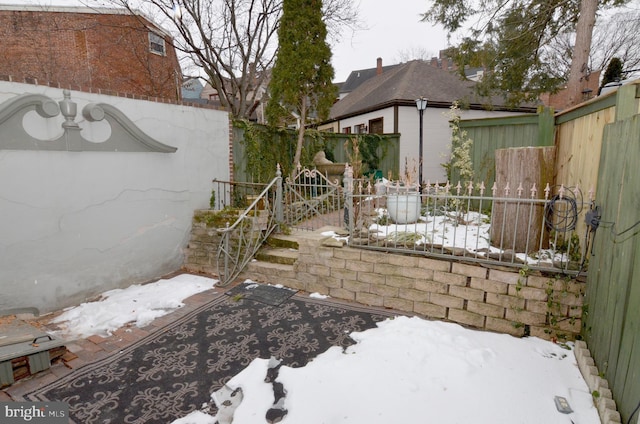 view of snow covered patio