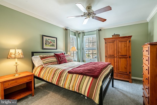 carpeted bedroom featuring ceiling fan and ornamental molding