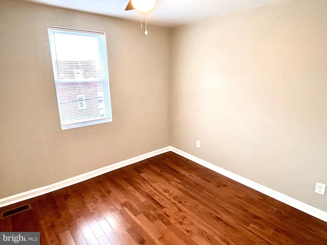 unfurnished room featuring ceiling fan and wood-type flooring