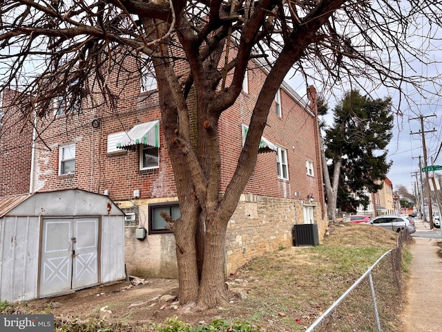 view of home's exterior featuring central AC unit