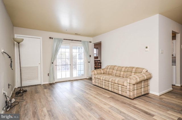 unfurnished living room with hardwood / wood-style floors