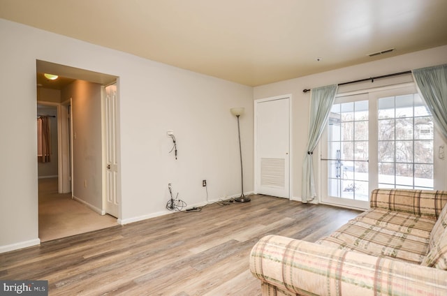 unfurnished room featuring hardwood / wood-style flooring