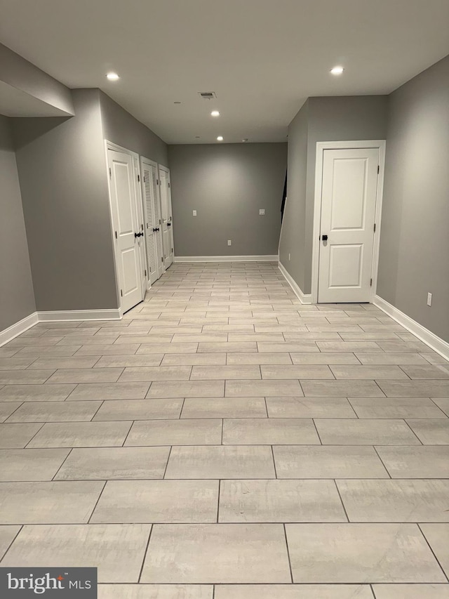 basement featuring light hardwood / wood-style floors