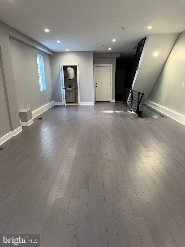 unfurnished living room with hardwood / wood-style floors