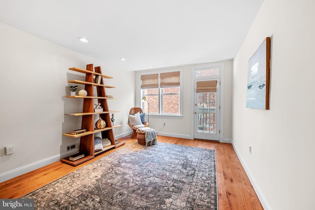 unfurnished room with light wood-type flooring