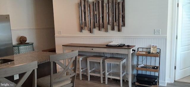 dining room with hardwood / wood-style flooring