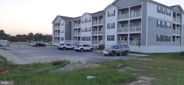 view of outdoor building at dusk