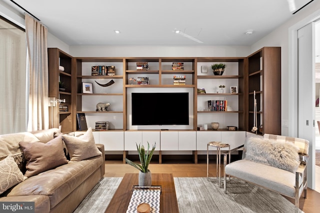 living room with light hardwood / wood-style floors