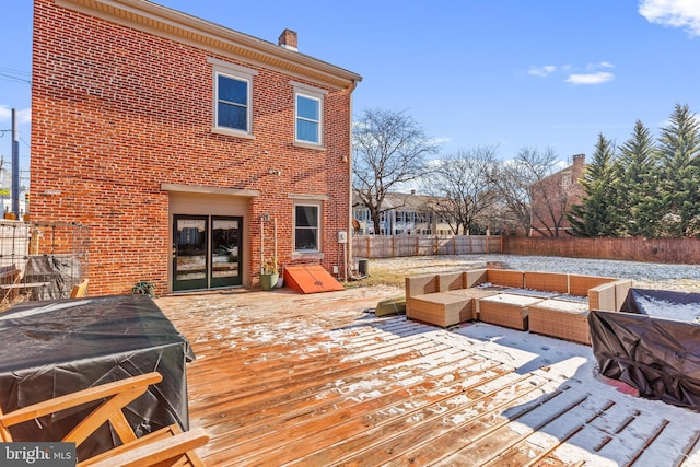 wooden terrace featuring an outdoor hangout area