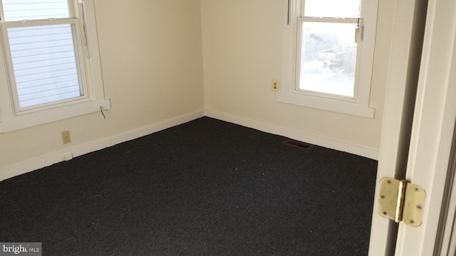 view of carpeted spare room