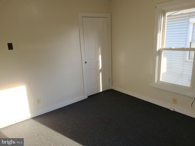 view of carpeted spare room