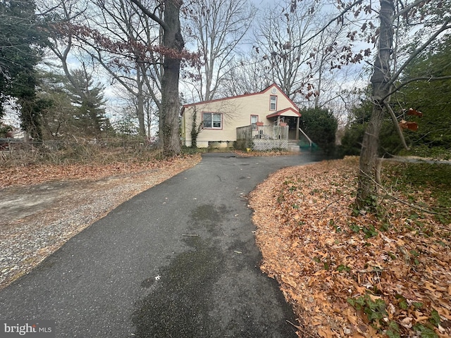 view of side of home featuring a deck