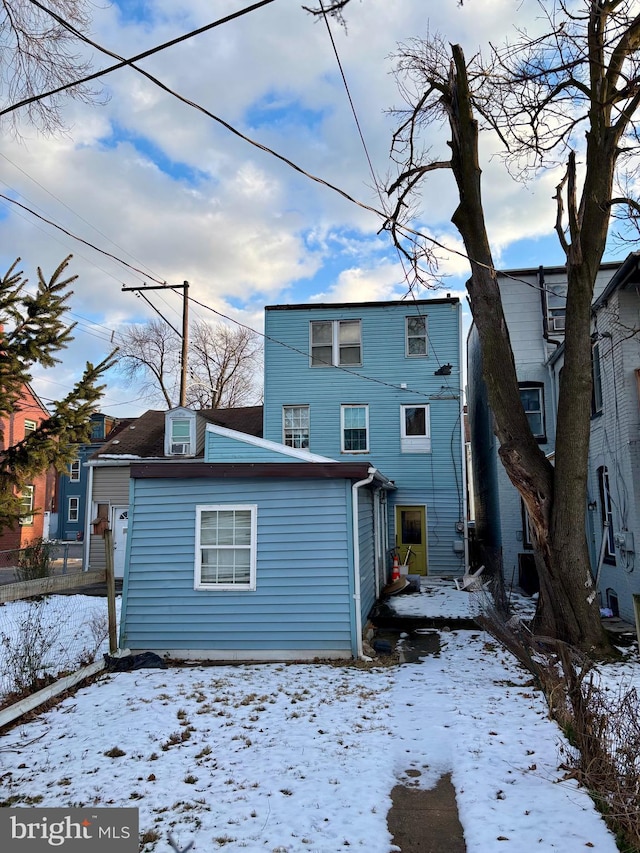 view of snow covered property