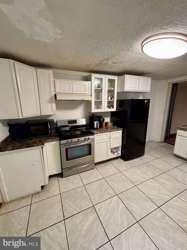 kitchen featuring black appliances, white cabinets, custom range hood, and a textured ceiling