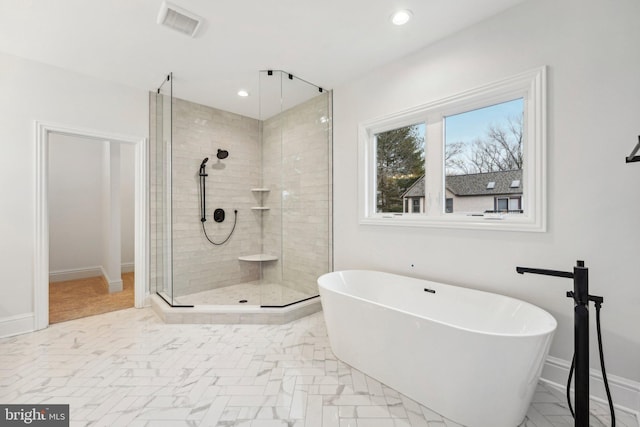 bathroom with independent shower and bath