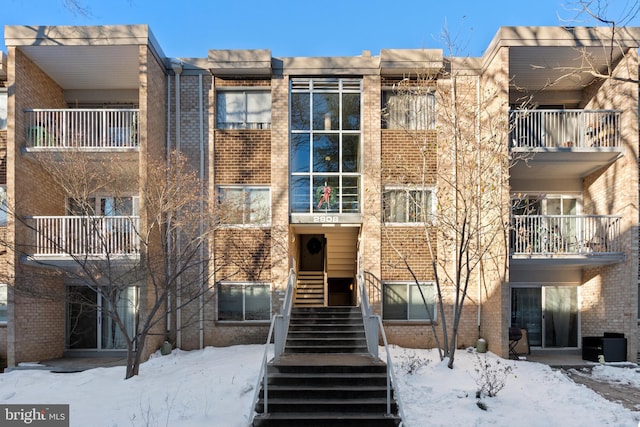 view of snow covered property