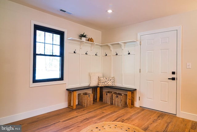 mudroom with light hardwood / wood-style flooring