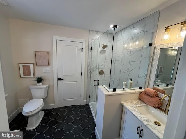 bathroom with toilet, tile patterned flooring, walk in shower, and vanity