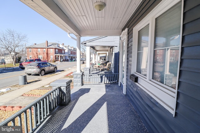 view of patio featuring a porch