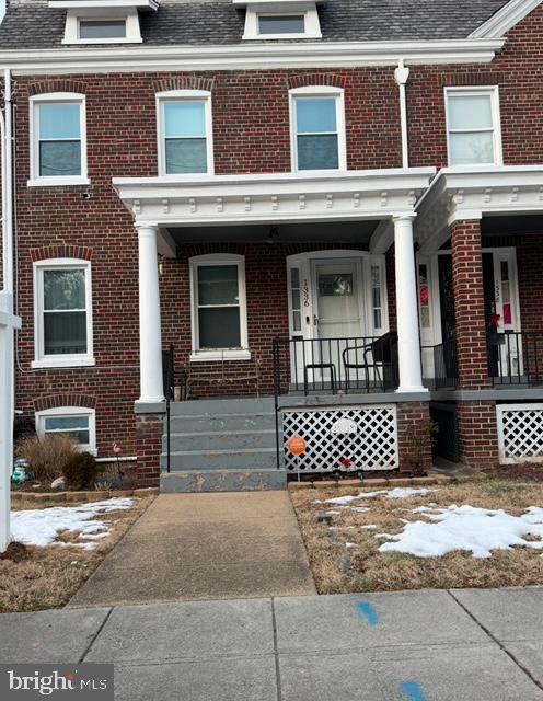 multi unit property featuring covered porch