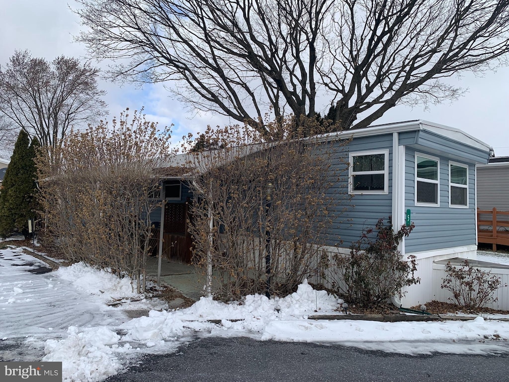 view of snow covered property