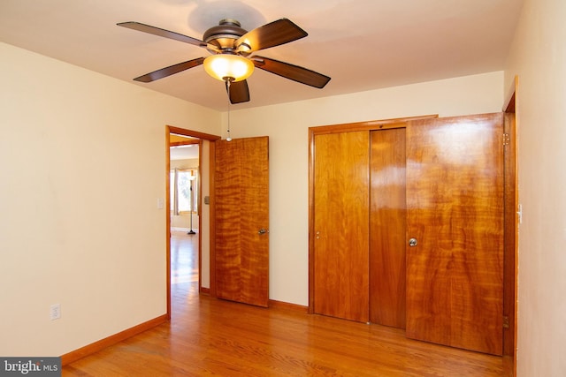 unfurnished bedroom featuring a closet, ceiling fan, and light hardwood / wood-style floors