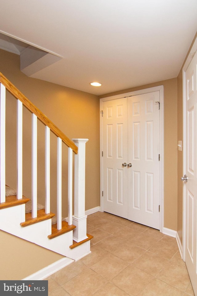 entryway with tile patterned flooring