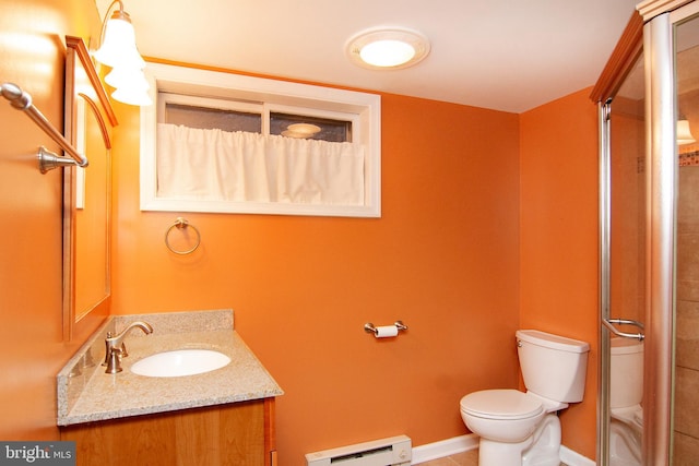 bathroom featuring toilet, tile patterned floors, vanity, a shower with door, and a baseboard heating unit