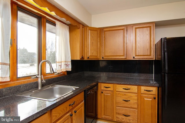 kitchen with sink and black appliances