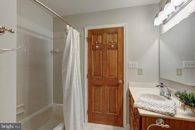 bathroom with shower / bath combination with curtain and vanity