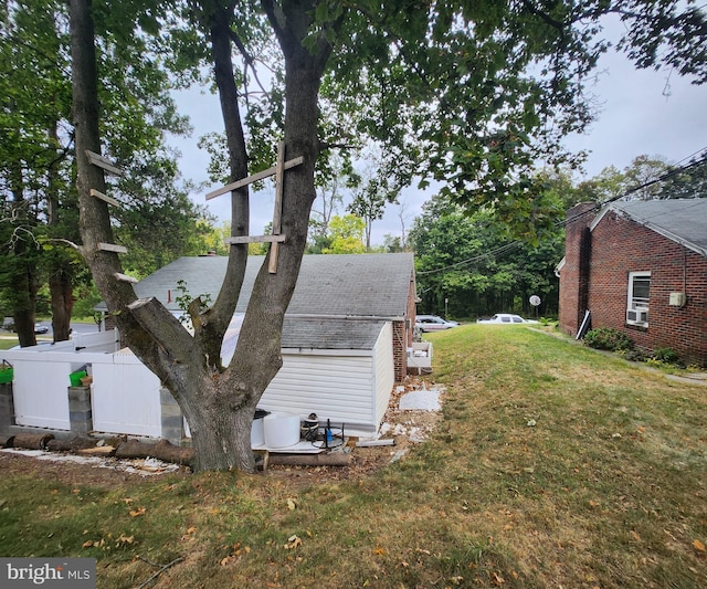 view of home's exterior featuring a lawn