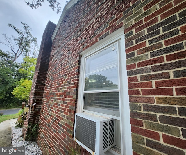 view of property exterior with cooling unit