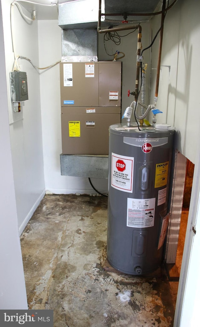 utility room with heating unit and electric water heater