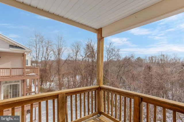 view of snow covered deck