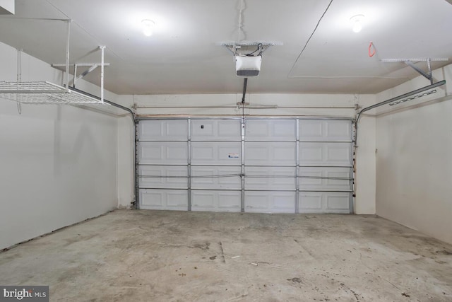 garage featuring a garage door opener