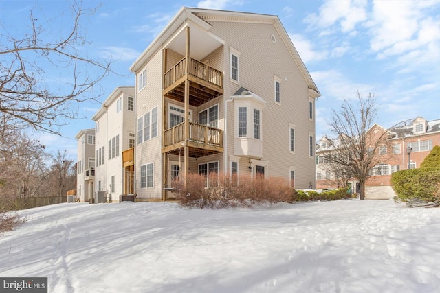 view of snow covered house