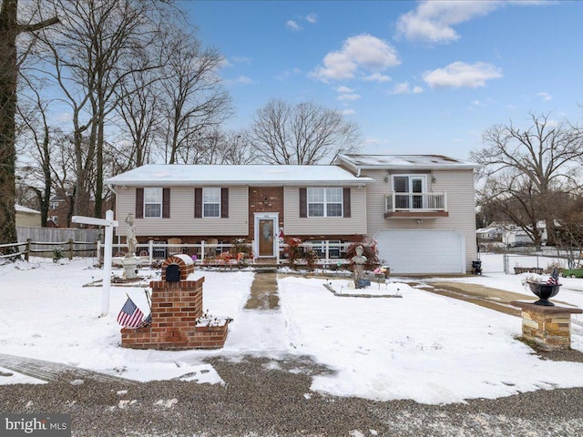 raised ranch featuring a garage