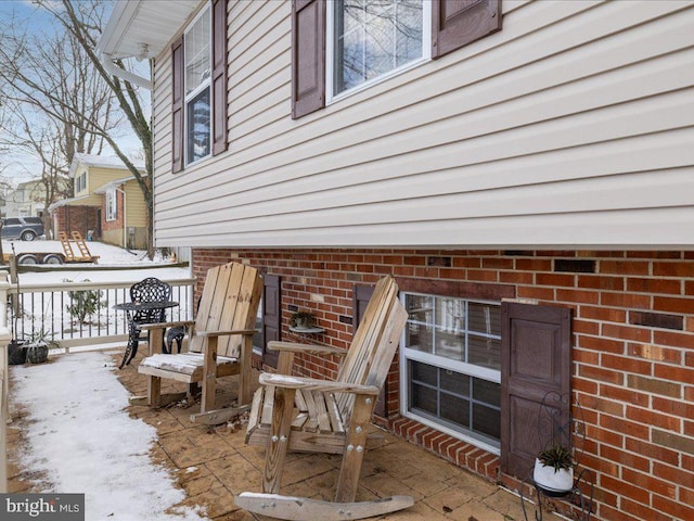 view of snow covered patio