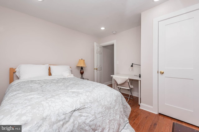 bedroom featuring wood-type flooring